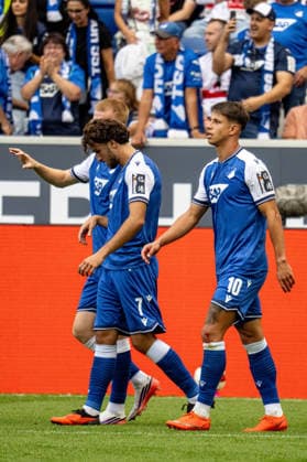 12.09.2026, xdaymx, Fussball 1.Bundesliga, TSG 1899 Hoffenheim - VfB Stuttgart. Torjubel zum 2:1 von Adam Hlozek (TSG Hoffenheim) mit der Mannschaft. (DFL DFB REGULATIONS PROHIBIT ANY USE OF PHOTOGRAPHS as IMAGE SEQUENCES and or QUASI-VIDEO) Sinsheim *** September 12, 2026, xdaymx, Soccer, Bundesliga 1, TSG 1899 Hoffenheim vs. VfB Stuttgart: Celebration of Adam Hlozek’s goal to make it 2–1. TSG Hoffenheim with the team. DFL and DFB regulations prohibit any use of photographs as image sequences and or quasi-video. Sinsheim