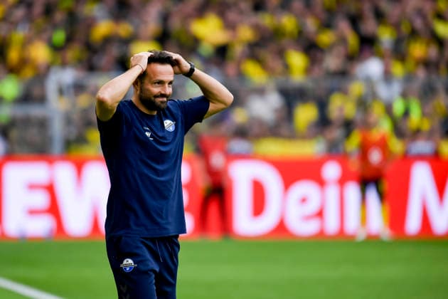 Trainer Ralf Kettemann (SC Paderborn 07) gestikuliert waehrend des spiels der 1. Bundesliga zwischen Borussia Dortmund und SC Paderborn 07, Signal Iduna Park am 12. September 2026 in Dortmund, Deutschland. (Foto von Max Maiwald DeFodi Images) +++ Trainer Ralf Kettemann (SC Paderborn 07) gestures during the Bundesliga match between Borussia Dortmund and SC Paderborn 07 at Signal Iduna Park on September 12, 2026 in Dortmund, Germany. (Photo by Max Maiwald DeFodi Images) DFB DFL REGULATIONS PROHIBIT ANY USE OF PHOTOGRAPHS AS IMAGE SEQUENCES AND OR QUASI-VIDEO. (Photo by Max Maiwald DeFodi Images) - *** SC Paderborn 07 coach Ralf Kettemann gestures during the Bundesliga match between Borussia Dortmund and SC Paderborn 07 at Signal Iduna Park on September 12, 2026, in Dortmund, Germany. Photo by Max Maiwald, DeFodi Images. Coach Ralf Kettemann of SC Paderborn 07 gestures during the Bundesliga match between Borussia Dortmund and SC Paderborn 07 at Signal Iduna Park on September 12, 2026 in Dortmund, Germany. Photo by Max Maiwald, DeFodi Images. DFB and DFL regulations prohibit any use of photographs as image sequences and or quasi-video. Photo by Max Maiwald, DeFodi Images.