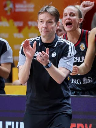 German national team coach Olaf Lange cheers as Germany plays in the semifinals of the 2026 FIBA Women s Basketball World Cup in Germany against France at the Berlin Arena on September 12, 2026, in Berlin, Germany. Photo by Marco Steinbrenner, DeFodi Images
