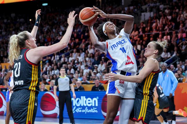 Frieda Buhner (Germany), Dominique Malonga (France), and Leonie Fiebich (Germany) battle for the ball during the semifinals match of the 2026 FIBA Women’s Basketball World Cup in Germany between France and Germany at the Berlin Arena on September 12, 2026, in Berlin, Germany. Photo by Marco Steinbrenner, DeFodi Images