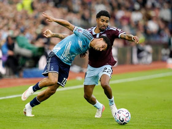 Birmingham, England, 12th September 2026. Morgan Gibbs White of Nottingham Forest takes on Ian Maatsen of Aston Villa during the Aston Villa vs Nottingham Forest Premier League match at Villa Park, Birmingham. Picture credit should read: Andrew Yates Sportimage EDITORIAL USE ONLY. No use with unauthorised audio, video, data, fixture lists, club league logos or live services. Online in-match use limited to 120 images, no video emulation. No use in betting, games or single club league player publications. SPI_024_AY_Villa_Forest SPI-4990-0024