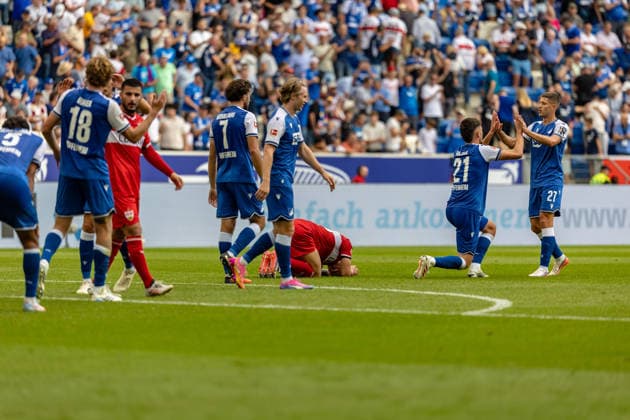 Emotionen Trauer Freude auf beiden Seiten Finn Jeltsch (VfB Stuttgart, 29) am Boden Albian Hajdari (TSG Hoffenheim, 21) und Andrej Kramaric (TSG Hoffenheim, 27) klatschen ab, GER, TSG Hoffenheim vs. VfB Stuttgart, Fussball, 1. Bundesliga, 03. Spieltag, Spielzeit 2026 2027, 12.09.2026, DFL DFB REGULATIONS PROHIBIT ANY USE OF PHOTOGRAPHS AS IMAGE SEQUENCES AND OR QUASI-VIDEO, GER, TSG Hoffenheim vs. VfB Stuttgart, Fussball, 1. Bundesliga, 03. Spieltag, Spielzeit 2026 2027, 12.09.2026 Sinsheim *** Emotions: Sadness and Joy on Both Sides. Finn Jeltsch (VfB Stuttgart), 29, on the ground; Albian Hajdari (TSG Hoffenheim), 21, and Andrej Kramaric (TSG Hoffenheim), 27, clap, GER, TSG Hoffenheim vs. VfB Stuttgart, soccer, Bundesliga 1, Matchday 3, 2026–2027 season, September 12, 2026, DFL and DFB regulations prohibit any use of photographs as image sequences and or quasi-video, GER, TSG Hoffenheim vs. VfB Stuttgart, soccer, Bundesliga 1, Matchday 3, 2026–2027 Season, September 12, 2026, Sinsheim Copyright: xEibner-Pressefoto JanixPlessx EP_JPL