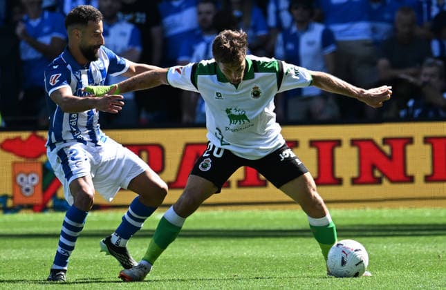 ESP LaLiga EA Sports: Racing Santander vs. Deportivo Alavés. Abde Rebbach of Alavés and Sergio Canales of Racing Santander during the LaLiga EA Sports match between Racing Santander and Deportivo Alavés, played at Campos de Sport de El Sardinero Stadium in Cantabria on September 12, 2026, in Spain. Spanish Soccer Copyright: xAgenciaxLOFx