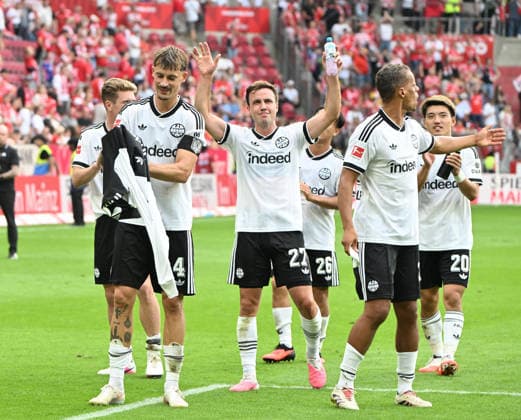 Fussball-Bundesliga - Saison 2026 2027 Mewa-Arena Mainz - 12.09.2026 1. FSV Mainz 05 (mz) - Eintracht Frankfurt (f) 1:3 Frankfurter Jubel, mi: Mario GOETZE (Eintracht Frankfurt)li: Robin KOCH (Eintracht Frankfurt) DFL REGULATIONS PROHIBIT ANY USE OF PHOTOGRAPHS AS IMAGE SEQUENCES AND OR QUASI VIDEO EDITORIAL USE ONLY NATIONAL AND INTERNATIONAL NEWS AGENCIES OUT Fussball-Bundesliga - 1. FSV Mainz 05 *** Soccer Bundesliga Season 2026–2027, Mewa Arena, Mainz, September 12, 2026, 1:00 p.m. FSV Mainz 05 vs. Eintracht Frankfurt, 1–3. Frankfurt fans celebrate, mi Mario GOETZE, Eintracht Frankfurt; li Robin KOCH, Eintracht Frankfurt. DFL regulations prohibit any use of photographs as image sequences and or quasi-video. Editorial use only by national and international news agencies. Out: German Bundesliga, 1. FSV Mainz 05