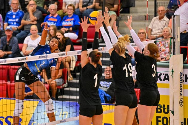 Volleyball Exhibition Match: Allianz MTV Stuttgart vs. VC Kanti Schaffhausen, September 12, 2026; Exhibition Match, Volleyball, Women s, 2026–2027 Season, Allianz MTV Stuttgart in blue vs. VC Kanti Schaffhausen (CH) in black; Leilani Slacanin on the attack against the Swiss three-player block consisting of 1 Ava Palm, 19 Anna Hartig, and 3 Sydney Cole, Copyright: xBEAUTIFULxSPORTS TomxBlochx