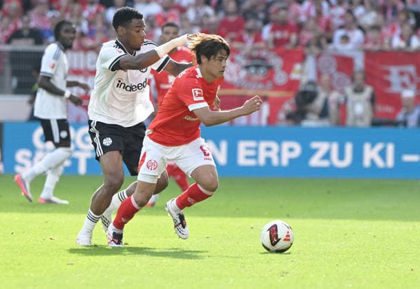 Fussball-Bundesliga - Saison 2026 2027 Mewa-Arena Mainz - 12.09.2026 1. FSV Mainz 05 (mz) - Eintracht Frankfurt (f) 1:3 Raphael ONYEDIKA (Eintracht Frankfurt), li - Kaishu SANO (1. FSV Mainz 05) DFL REGULATIONS PROHIBIT ANY USE OF PHOTOGRAPHS AS IMAGE SEQUENCES AND OR QUASI VIDEO EDITORIAL USE ONLY NATIONAL AND INTERNATIONAL NEWS AGENCIES OUT Fussball-Bundesliga - 1. FSV Mainz 05 *** Soccer Bundesliga Season 2026–2027 Mewa Arena Mainz September 12, 2026 1 FSV Mainz 05 vs. Eintracht Frankfurt 1–3 Raphael ONYEDIKA Eintracht Frankfurt, li Kaishu SANO 1 FSV Mainz 05 DFL REGULATIONS PROHIBIT ANY USE OF PHOTOGRAPHS AS IMAGE SEQUENCES AND OR QUASI-VIDEO; FOR EDITORIAL USE ONLY BY NATIONAL AND INTERNATIONAL NEWS AGENCIES. OUT: German Bundesliga 1 FSV Mainz 05
