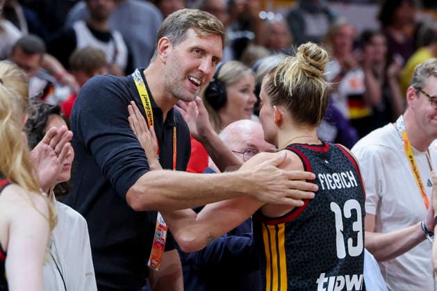 Dirk Nowitzki and Leonie Fiebich of Germany hug each other during the FIBA Women s Basketball World Cup Germany 2026 semifinal match between France and Germany at the Berlin Arena on September 12, 2026, in Berlin, Germany. Photo by Marco Steinbrenner, DeFodi Images