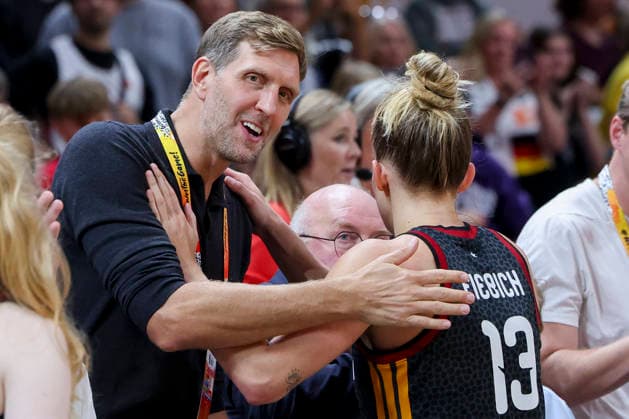 Dirk Nowitzki and Leonie Fiebich of Germany hug each other during the FIBA Women s Basketball World Cup Germany 2026 semifinal match between France and Germany at the Berlin Arena on September 12, 2026, in Berlin, Germany. Photo by Marco Steinbrenner, DeFodi Images