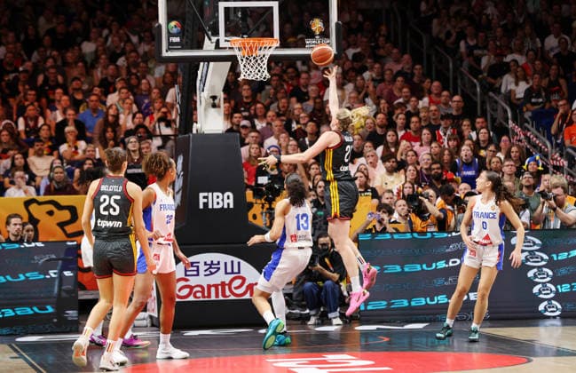 Marie Gülich drives to the basket; Janelle Salaun, one-on-one, game action, sports, basketball, FIBA World Cup, Women s World Championship, World Cup, semifinals, 2026–2027 season, December 9, 2026, France (FRA) vs. DBB Germany (GER)