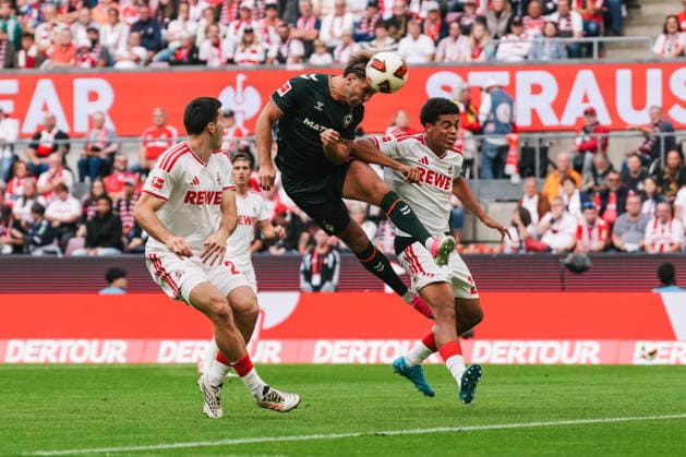 12.09.2026, xjmrgnx, Fussball 1.Bundesliga, 1.FC Koeln - SV Werder Bremen v.l. Kopfball von Niclas Füllkrug (10, Bremen) gegen Luka Lochoshvili (24, Koeln) und Jahmai Simpson-Pusey (22, Koeln) (DFL DFB REGULATIONS PROHIBIT ANY USE OF PHOTOGRAPHS as IMAGE SEQUENCES and or QUASI-VIDEO) Koeln *** September 12, 2026, xjmrgnx, Soccer, Bundesliga 1, 1. FC Köln vs. SV Werder Bremen: Niclas Füllkrug (No. 10) heads the ball against Luka Lochoshvili (No. 24) of Bremen, and Jahmai Simpson Pusey (No. 22) of Köln, Cologne DFL DFB REGULATIONS PROHIBIT ANY USE OF PHOTOGRAPHS AS IMAGE SEQUENCES AND OR QUASI-VIDEO Cologne