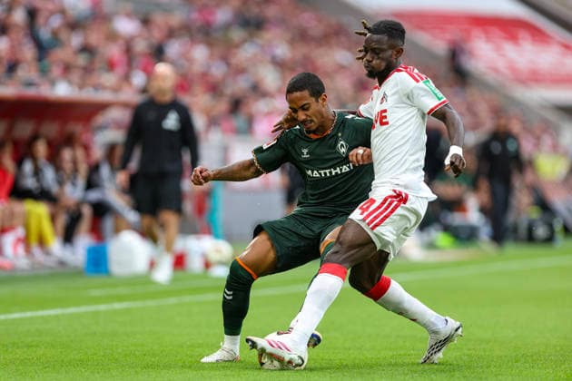 12.09.2026, GER, Fussball, Herren, Bundesliga , Saison 2026 2027, 1. FC Köln - SV Werder bremen Arthur (Bremen) und Gideon Mensah (Köln) im Kampf um den Ball Köln RheinEnergieSTADION Nordrhein-Westfalen Deutschland *** September 12, 2026, Germany, Soccer, Men s, Bundesliga, 2026–2027 Season, 1. FC Köln vs. SV Werder Bremen: Arthur Bremen and Gideon Mensah of Köln battle for the ball at the RheinEnergieSTADION in Cologne, North Rhine-Westphalia, Germany Copyright: xAdrianxSchlüterx