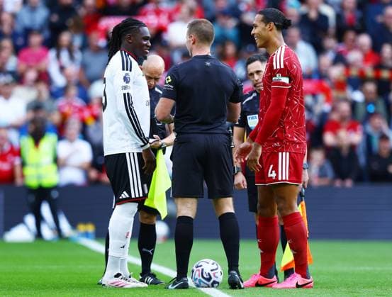 Calvin Bassey of Fulham and Virgil van Dijk of Liverpool Liverpool v Fulham, Premier League, Football, Football, Anfield, Liverpool, UK - 12 Sep 2026Liverpool Anfield United Kingdom EDITORIAL USE ONLY No use with unauthorised audio, video, data, fixture lists, club league logos or live services. Online in-match use limited to 120 images, no video emulation. No use in betting, games or single club league player publications.  Copyright: xMattxWest Shutterstockx 17144551cv