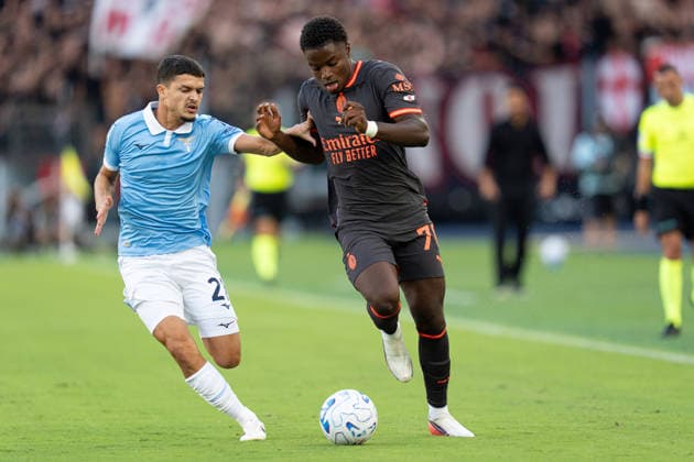 SS Lazio v AC Milan - Serie A Enilive Alphadjo Cisse of AC Milan and Reda Belahyane of SS Lazio compete for the ball during the Serie A Enilive match between SS Lazio and AC Milan at Olympic Stadium on September 12, 2026 in Rome, Italy Rome Olympic Stadium Lazio Italy Copyright: xGiuseppexMaffiax 20260912_180814_SerieA_Lazio-Milan_LIA06998
