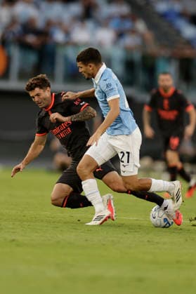 Serie A football match SS Lazio vs Ac Milan Milan™s American forward Christian Pulisic challenges for the ball with lazio™s Moroccan midfielder Reda Belahyane during the Serie A football match SS Lazio vs AC Milan at Olimpico Stadium on September 12, 2026, in Rome. _BPH7264 Copyright: xAntonioxBalascox