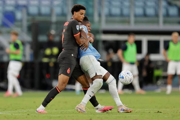 Serie A football match SS Lazio vs Ac Milan Milan s Belgian defender Koni De Winter challenges for the ball with lazio™s Dutch forward Tijjani Noslin during the Serie A football match SS Lazio vs AC Milan at Olimpico Stadium on September 12, 2026, in Rome. _BPH7850 Copyright: xAntonioxBalascox
