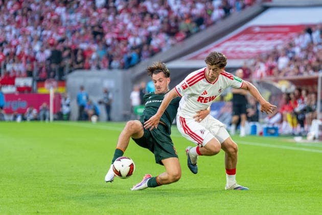Oliver Deman (SV Werder Bremen, 02) im Zweikampf mit Mikey Moore (1.FC Koeln, 47) um den Ball 1.FC Köln vs. SV Werder Bremen, Fussball, Bundesliga, 3.Spieltag, Saison 2026 27, 12.09.2026, DFL REGULATIONS PROHIBIT ANY USE OF PHOTOGRAPHS AS IMAGE SEQUENCES AND OR QUASI-VIDEO, 1.FC Köln vs. SV Werder Bremen, Fussball, Bundesliga, 3.Spieltag, Saison 2026 27, 12.09.2026 Köln *** Oliver Deman (SV Werder Bremen), No. 02, in a tackle with Mikey Moore (1. FC Köln), No. 47, for the ball; 1. FC Köln vs. SV Werder Bremen, Soccer, Bundesliga, Matchday 3, 2026–27 season, September 12, 2026; DFL regulations prohibit any use of photographs as image sequences and or quasi-video, 1 FC Köln vs. SV Werder Bremen, Soccer, Bundesliga, Matchday 3, 2026–27 Season, September 12, 2026, Cologne Copyright: xEibner-Pressefoto LukasxBaldygax EP_LBA