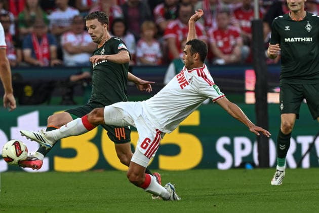 v. li. im Zweikampf Youri Regeer (Bremen 44) Ellyes Skhiri (Koeln 6) 12.09.2026 ¢ Fussball ¢ 1. FC Koeln vs SV Werder Bremen, RheinEnergieStadion, Koeln, DFB DFL REGULATIONS PROHIBIT ANY USE OF PHOTOGRAPHS AS IMAGE SEQUENCES AND OR QUASI-VIDEO NRW Germany *** From left: Youri Regeer (Bremen 44) and Ellyes Skhiri (Cologne 6) in a one-on-one duel, September 12, 2026 ¢ Soccer ¢ 1. FC Cologne vs. SV Werder Bremen, RheinEnergieStadion, Cologne, DFB and DFL regulations prohibit any use of photographs as image sequences and or quasi-video. NRW, Germany Copyright: xpepphotox xHorstxMauelshagenx pep00321, pep_20260912_hm