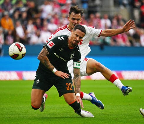 12.09.2026, xophax, Fussball 1.Bundesliga, 1.FC Koeln - SV Werder Bremen . Nach dem 1 zu 0 für den 1.FC Köln : Marco Friedl , vorn ( SV Werder Bremen ) und Thijs Dallinga ( 1.FC Köln ) (DFL DFB REGULATIONS PROHIBIT ANY USE OF PHOTOGRAPHS as IMAGE SEQUENCES and or QUASI-VIDEO) Koeln *** September 12, 2026, xophax, Soccer, Bundesliga 1, 1. FC Köln vs. SV Werder Bremen. After 1. FC Köln s 1-0 victory, Marco Friedl, in the foreground: SV Werder Bremen and Thijs Dallinga (1 FC Köln). DFL and DFB regulations prohibit any use of photographs as image sequences and or quasi-video. Cologne