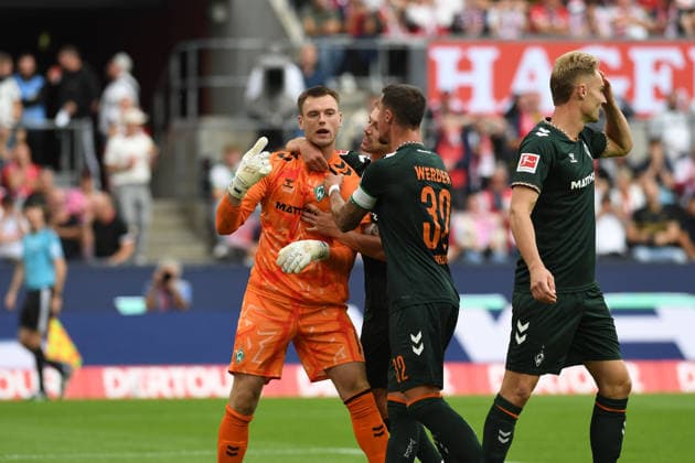 Torwart Karl Hein (Werder Bremen) wird nach pariertem Elfmeter bejubelt waehrend des Spiels der 1. Bundesliga zwischen 1. FC Koeln und SV Werder Bremen, RheinEnergieStadion am 12. September 2026 in Koeln, Deutschland. (Foto von Ralf Treese DeFodi Images) +++ Torwart Karl Hein (Werder Bremen) gestures during the Bundesliga match between 1. FC Koeln and SV Werder Bremen at RheinEnergieStadion on September 12, 2026 in Cologne, Germany. (Photo by Ralf Treese DeFodi Images) DFB DFL REGULATIONS PROHIBIT ANY USE OF PHOTOGRAPHS AS IMAGE SEQUENCES AND OR QUASI-VIDEO. (Photo by Ralf Treese DeFodi Images) - *** Goalkeeper Karl Hein of Werder Bremen is celebrated after saving a penalty kick during the Bundesliga match between 1. FC Köln and SV Werder Bremen, RheinEnergieStadion on September 12, 2026, in Cologne, Germany. Photo by Ralf Treese, DeFodi Images. Goalkeeper Karl Hein of Werder Bremen gestures during the Bundesliga match between 1. FC Köln and SV Werder Bremen at RheinEnergieStadion on September 12, 2026 in Cologne, Germany. Photo by Ralf Treese, DeFodi Images. DFB and DFL regulations prohibit any use of photographs as image sequences and or quasi-video. Photo by Ralf Treese, DeFodi Images.