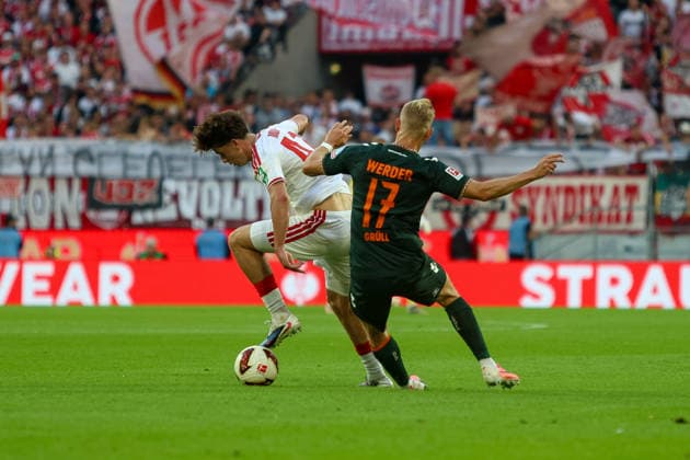 12.09.2026, GER, Fussball, Herren, Bundesliga , 1. Bundesliga, Saison 2026 2027, 1. FC Köln - SV Werder Bremen Mikey Moore (1. FC Köln) und Marco Grüll (SVW) im Kampf um den Ball *** September 12, 2026, GER, Soccer, Men s, Bundesliga, 1. Bundesliga, 2026–2027 Season, 1. FC Köln vs. SV Werder Bremen: Mikey Moore (1. FC Köln) and Marco Grüll (SVW) battle for the ball Copyright: xSvenxHanischx