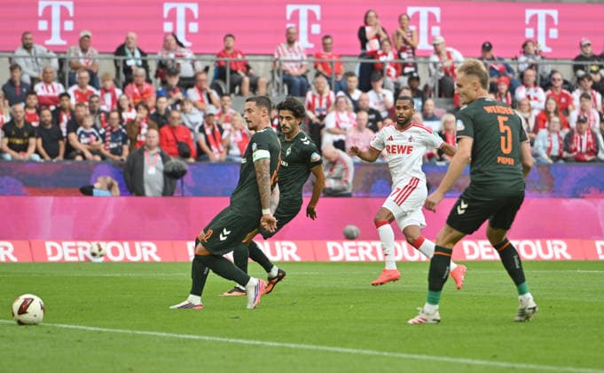 Linton Maina (1. FC Köln) schiesst das Tor zum 1:0, AKtion, (l-r) Marco Friedl (Werder Bremen), Eren Dinkci (Werder Bremen), Linton Maina (1. FC Köln), Amos Pieper (Werder Bremen). Fussball 1. Bundesliga, 3.Spieltag, 1. FC Koeln - SV Werder Bremen, am 12.09.2026 in Koeln Deutschland. DFL regulations prohibit any use of photographs as image sequences and or quasi-video Â *** Linton Maina of 1. FC Köln scores the goal to make it 1–0; in action, from left to right: Marco Friedl (Werder Bremen), Eren Dinkci (Werder Bremen), Linton Maina (1. FC Köln), Amos Pieper (Werder Bremen); Soccer, Bundesliga, Matchday 3, 1. FC Köln vs. SV Werder Bremen, on September 12, 2026, in Cologne, Germany. DFL regulations prohibit any use of photographs as image sequences and or quasi-video.