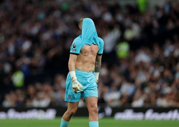12th September 2026; Tottenham Hotspur Stadium, London, England; Premier League Football, Tottenham Hotspur versus Everton; Goalkeeper Jordan Pickford of Everton hides his face in his shirt in frustration during the 2nd half JohnxPatrickxFletcher
