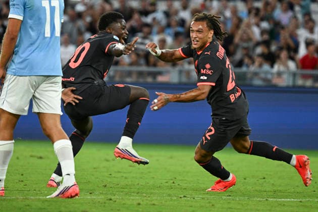 September 12, 2026, Rome, Italy: Milan™s Diego Moreira (R) celebrates his goal with Alphadjo Cisse (L) during the Serie A soccer match between SS Lazio and AC Milan at the Olimpico stadium in Rome, Italy, 12 September 2026. ANSA RICCARDO ANTIMIANI. Soccer: Serie A; Lazio Vs Milan  - ZUMAa110 20260912_zaf_a110_028 Copyright: xRiccardoxAntimianix