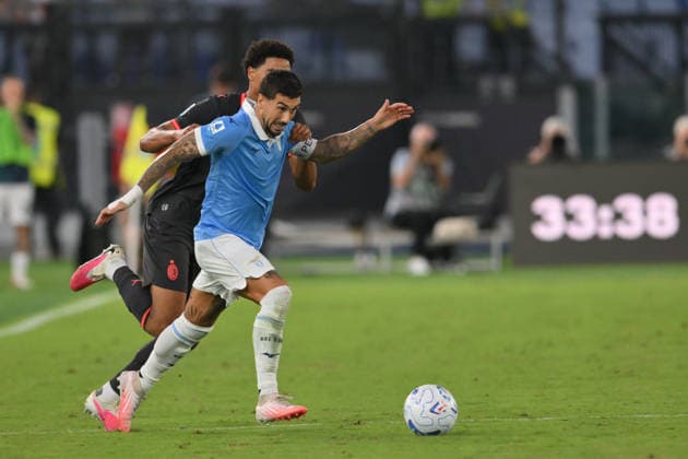 IPA88449739 - Mattia Zaccagni of Lazio under pressure from Ruben Loftus-Cheek of Milan during the UEFA Champions League soccer match between Lazio and Milan at the Stadio Olimpico on September 12, 2026, in Lazio, Milan. During the SS Lazio vs. AC Milan Italian Serie A soccer match in Rome, Italy, on September 12, 2026  Copyright: xRobertoxRamaccia IPAxSportx xx IPA88449739