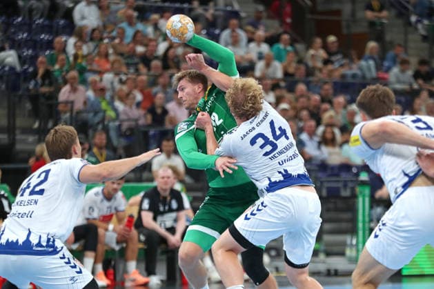Handball, HBL2 SC DHfK Leipzig vs. VfL Lübeck Schwartau, September 12, 2026: Franz Semper (32) of SC DHfK Leipzig is attacked by Thore Heinemann (34) of Lübeck Schwartau. Handball, 2nd Bundesliga, 2026–2027 season, Matchday 3: SC DHfK Leipzig vs. VfL Lübeck Schwartau on September 12, 2026, at the Quarterback Immobilien Arena in Leipzig Copyright: xBEAUTIFULxSPORTS JanxKaeferx
