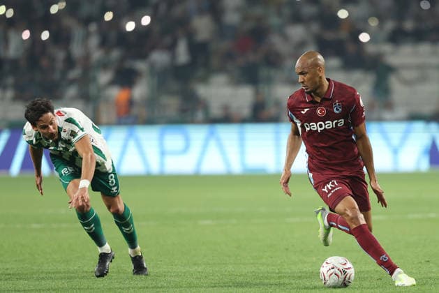 KONYA, TURKEY - SEPTEMBER 12: Marko Jevtovic (8) of Konyaspor and Fabio Henrique Tavares ( Fabinho ) (6) of Trabzonspor battle for the ball during the Turkish Super League 2026 27 match between Konyaspor and Trabzonspor at Medas Konya Buyuksehir Stadium on September 12, 2026 in Konya, Turkey. Konya Turkey Copyright: xSeskimphotox Konya-Trabzon-1209 (10)
