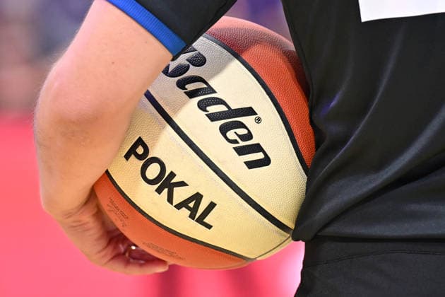 BG Göttingen SYNTAINICS MBC September 12, 2026, Göttingen Basketball BBL Cup, BG Göttingen SYNTAINICS MBC, Round 1, Sparkassen Arena. A basketball with the word POKAL written on it is being held. Photo by Swen Pförtner, Göttingen, Lower Saxony, Germany
