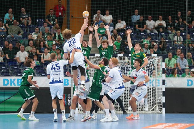 Handball, HBL2 SC DHfK Leipzig vs. VfL Lübeck Schwartau, September 12, 2026: Luka Rogan (33), SC DHfK Leipzig, Tim Hertzfeld 72, SC DHfK Leipzig, and Matej Klima 13, SC DHfK Leipzig, form a defensive block to try to block the shot by Magnus Holpert 22, Lübeck Schwartau. Handball, 2nd Bundesliga, 2026–2027 season, Matchday 3: SC DHfK Leipzig vs. VfL Lübeck Schwartau on September 12, 2026, at the Quarterback Immobilien Arena in Leipzig Copyright: xBEAUTIFULxSPORTS JanxKaeferx