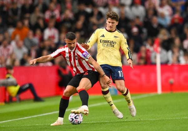 Granit Xhaka of Sunderland fends off Christos Tzolis of Arsenal Sunderland v Arsenal, Premier League, Football, Football, Stadium of Light, Sunderland, UK - 12 Sep 2026Sunderland Stadium of Light United Kingdom EDITORIAL USE ONLY No use with unauthorised audio, video, data, fixture lists, club league logos or live services. Online in-match use limited to 120 images, no video emulation. No use in betting, games or single club league player publications.  Copyright: xRichardxLee Shutterstockx 17144590t