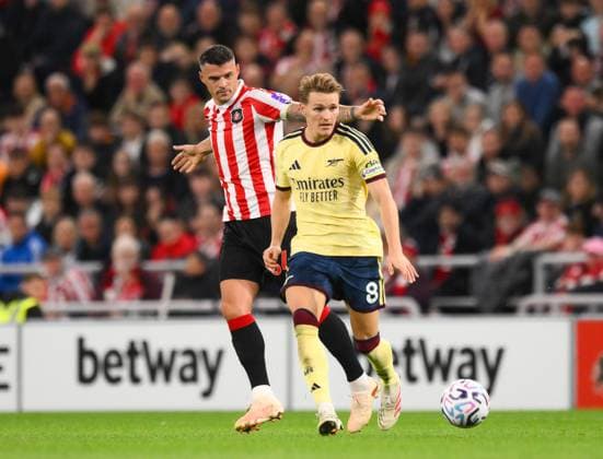 Martin Odegaard of Arsenal (right) and Granit Xhaka of Sunderland Sunderland v Arsenal, Premier League, Football, Football, Stadium of Light, Sunderland, UK - 12 Sep 2026Sunderland Stadium of Light United Kingdom EDITORIAL USE ONLY No use with unauthorised audio, video, data, fixture lists, club league logos or live services. Online in-match use limited to 120 images, no video emulation. No use in betting, games or single club league player publications.  Copyright: xRichardxLee Shutterstockx 17144590w