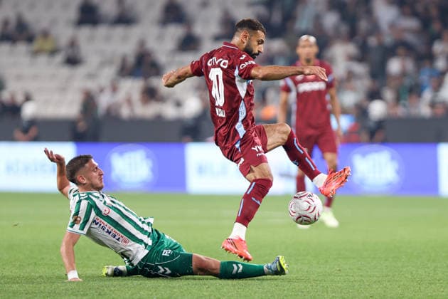 TUMOSAN Konyaspor v Trabzonspor - Turkish Super Lig KONYA, TURKIYE - SEPTEMBER 6: Trabzonspor s Mohamed Salah and Konyaspor s Melih Ibrahimoglu vie the ball during the Turkish Super Lig week 5 match between TUMOSAN Konyaspor and Trabzonspor at MEDAS Konya Metropolitan Stadium in Konya, Turkiye, on September 12, 2026. Serhat Çetinkaya Anadolu Konya Turkey. Editorial use only. Please get in touch for any other usage.  Copyright: x2026xAnadoluxSerhatxÃ‡etinkayax