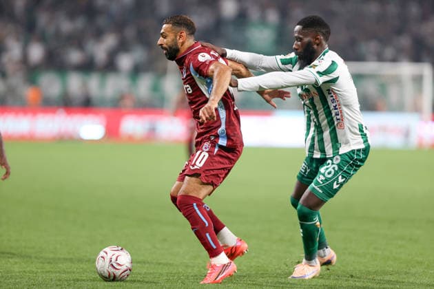 TUMOSAN Konyaspor v Trabzonspor - Turkish Super Lig KONYA, TURKIYE - SEPTEMBER 6: Trabzonspor s Mohamed Salah and Konyaspor s Arthur Masuaku vie the ball during the Turkish Super Lig week 5 match between TUMOSAN Konyaspor and Trabzonspor at MEDAS Konya Metropolitan Stadium in Konya, Turkiye, on September 12, 2026. Serhat Çetinkaya Anadolu Konya Turkey. Editorial use only. Please get in touch for any other usage.  Copyright: x2026xAnadoluxSerhatxÃ‡etinkayax