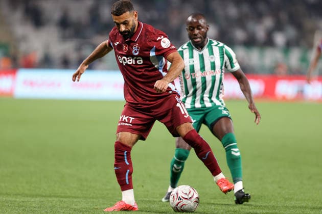 TUMOSAN Konyaspor v Trabzonspor - Turkish Super Lig KONYA, TURKIYE - SEPTEMBER 6: Trabzonspor s Mohamed Salah and Konyaspor s Jean Luc Dompe vie the ball during the Turkish Super Lig week 5 match between TUMOSAN Konyaspor and Trabzonspor at MEDAS Konya Metropolitan Stadium in Konya, Turkiye, on September 12, 2026. Serhat Çetinkaya Anadolu Konya Turkey. Editorial use only. Please get in touch for any other usage.  Copyright: x2026xAnadoluxSerhatxÃ‡etinkayax