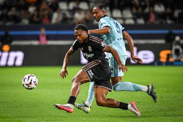 September 12, 2026, Paris, France, France: Lois OPENDA of Lyon and Samir CHERGUI of Paris FC during the Ligue 1 match between Paris FC and Olympique Lyonnais (OL) at Jean-Bouin Stadium on September 12, 2026 in Paris, France. Paris France - ZUMAm308 20260912_zsp_m308_005 Copyright: xMatthieuxMirvillex