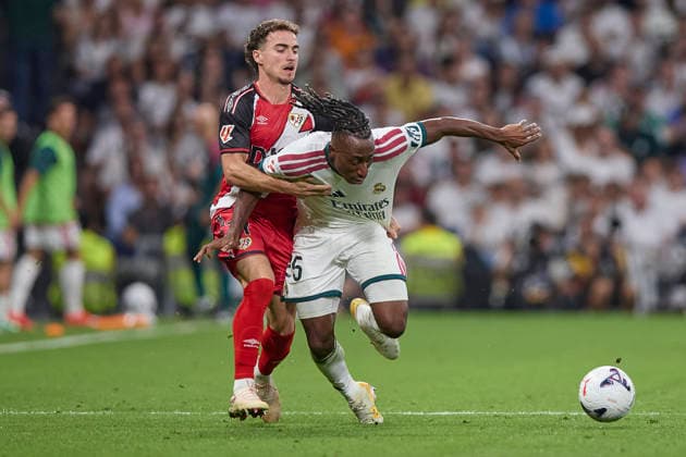 Yan Diomande (Real Madrid CF) and Adria Pedrosa (Rayo Vallecano) battle for the ball during the LaLiga EA Sports match between Real Madrid CF and Rayo Vallecano de Madrid at Estadio Santiago BernabÃ u on September 12, 2026 in Madrid, Spain. (Photo by Manu Reino DeFodi Images) - *** Yan Diomande of Real Madrid CF and Adria Pedrosa of Rayo Vallecano battle for the ball during the LaLiga EA Sports match between Real Madrid CF and Rayo Vallecano de Madrid at Estadio Santiago Bernabéu on September 12, 2026, in Madrid, Spain. Photo by Manu Reino, DeFodi Images
