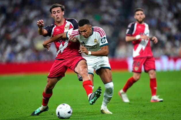 ESP: Real Madrid - Rayo Vallecano. La Liga EA Sports. Matchday 5. Kylian Mbappe of Real Madrid CF and Pedro Diaz of Rayo Vallecano during the La Liga EA Sports match between Real Madrid and Rayo Vallecano played at Santiago Bernabeu Stadium on 12 Sep 2026 in Madrid, Spain. kpng Copyright: xCesarxCebollax xPRESSINPHOTOx PS_2627_RMA_RAY_063