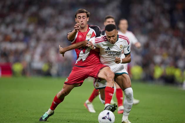 Kylian Mbappe (Real Madrid CF) and Pedro Diaz (Rayo Vallecano) battle for the ball during the LaLiga EA Sports match between Real Madrid CF and Rayo Vallecano de Madrid at Estadio Santiago BernabÃ u on September 12, 2026 in Madrid, Spain. (Photo by Manu Reino DeFodi Images) - *** Kylian Mbappé of Real Madrid CF and Pedro Díaz of Rayo Vallecano battle for the ball during the LaLiga EA Sports match between Real Madrid CF and Rayo Vallecano de Madrid at Estadio Santiago Bernabéu on September 12, 2026, in Madrid, Spain. Photo by Manu Reino, DeFodi Images