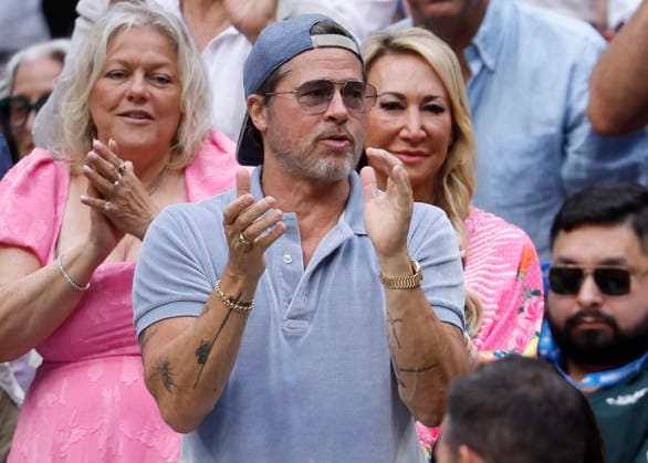 Actor Brad Pitt applauds as he watches the Women s Finals match in Arthur Ashe Stadium at the 2026 US Open Tennis Championship at the USTA Billie Jean King National Tennis Center in New York City on Saturday, September 12, 2026.  NYP20260912612 JOHNxANGELILLO