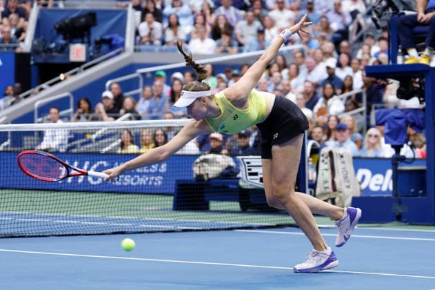 Elena Rybakina of Kazakhstan reaches for a return to Aryna Sabalenka of Belarus in the second set of the Women s Finals match in Arthur Ashe Stadium at the 2026 US Open Tennis Championship at the USTA Billie Jean King National Tennis Center in New York City on Saturday, September 12, 2026.  NYP20260912846 JOHNxANGELILLO