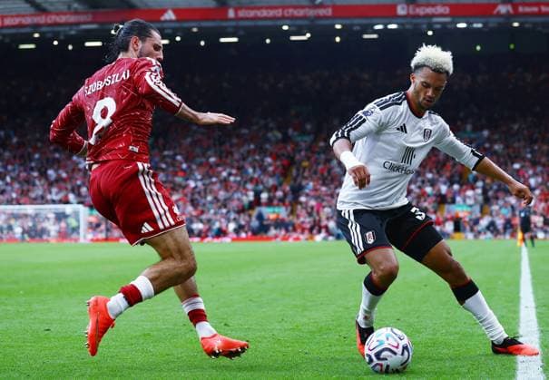 Antonee Robinson of Fulham and Dominik Szoboszlai of Liverpool Liverpool v Fulham, Premier League, Football, Football, Anfield, Liverpool, UK - 12 Sep 2026Liverpool Anfield United Kingdom EDITORIAL USE ONLY No use with unauthorised audio, video, data, fixture lists, club league logos or live services. Online in-match use limited to 120 images, no video emulation. No use in betting, games or single club league player publications.  Copyright: xMattxWest Shutterstockx 17144551en