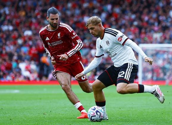 Emile Smith Rowe of Fulham and Dominik Szoboszlai of Liverpool Liverpool v Fulham, Premier League, Football, Football, Anfield, Liverpool, UK - 12 Sep 2026Liverpool Anfield United Kingdom EDITORIAL USE ONLY No use with unauthorised audio, video, data, fixture lists, club league logos or live services. Online in-match use limited to 120 images, no video emulation. No use in betting, games or single club league player publications.  Copyright: xMattxWest Shutterstockx 17144551eo