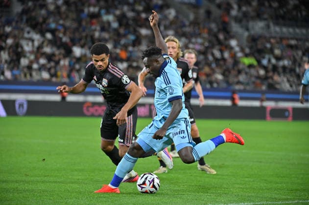 Ligue 1 McDonald s 2026 27, Paris FC vs Olympique Lyonnais, Football Zachary Athekame of Lyon and Moses Simon of Paris FC during the Ligue 1 McDonald s 2026 27 match between Paris FC and Olympique Lyonnais at Stade Jean Bouin on September 12, 2026 in Paris, France. Paris Stade Jean Bouin France
