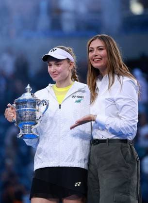 Elena Rybakina of Kazakhstan celebrates with the trophy next to Maria Sharapova 2026 US Open, Day Fourteen, USTA Billie Jean King National Tennis Center, New York, USA - 12 Sep 2026New York USTA Billie Jean King National T New York (NY) United States of America EDITORIAL USE ONLY No use with unauthorised audio, video, data, fixture lists, club league logos or live services. Online in-match use limited to 120 images, no video emulation. No use in betting, games or single club league player publications.  Copyright: xEllaxLing Shutterstockx 17140165bt