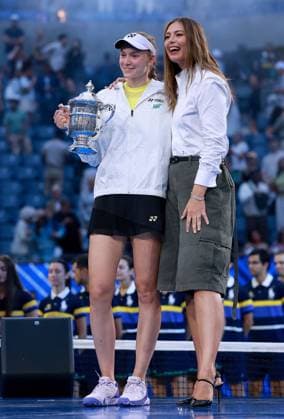 Elena Rybakina of Kazakhstan celebrates with the trophy next to Maria Sharapova 2026 US Open, Day Fourteen, USTA Billie Jean King National Tennis Center, New York, USA - 12 Sep 2026New York USTA Billie Jean King National T New York (NY) United States of America EDITORIAL USE ONLY No use with unauthorised audio, video, data, fixture lists, club league logos or live services. Online in-match use limited to 120 images, no video emulation. No use in betting, games or single club league player publications.  Copyright: xEllaxLing Shutterstockx 17140165co