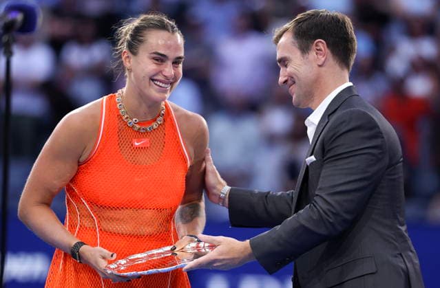 US Open tennis tournament - Day 14 Aryna Sabalenka (L) of Belarus receives the runner up trophy from the Chairman of the Board and President of the United States Tennis Association (USTA) Brian Vahaly after losing to Elena Rybakina of Kazakhstan in the Women’s Singles Finals of the US Open Tennis Championships in Flushing Meadows, New York, USA, 12 September 2026. FLUSHING MEADOWS NEW YORK United States  Copyright: xSARAHxYENESELx