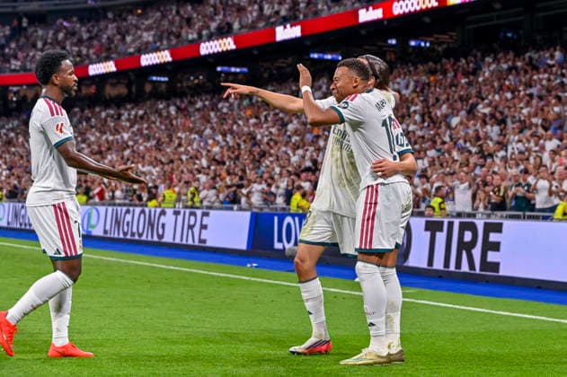 September 12, 2026, Madrid, Madrid, Spain: 18 ALVARO CARRERAS of Real Madrid CF and 10 KYLIAN MBAPPE of Real Madrid CF celebrates a goal (2-0) during the match on Matchday 5 of the 2026 27 National League First Division Championship between REAL MADRID C.F. 4 and RAYO VALLECANO 1, played at the Bernabo u Stadium on September 12, 2026, in Madrid, Spain. Madrid Spain - ZUMAc312 20260912_zsp_c312_037 Copyright: xOscarxManuelxSanchezx